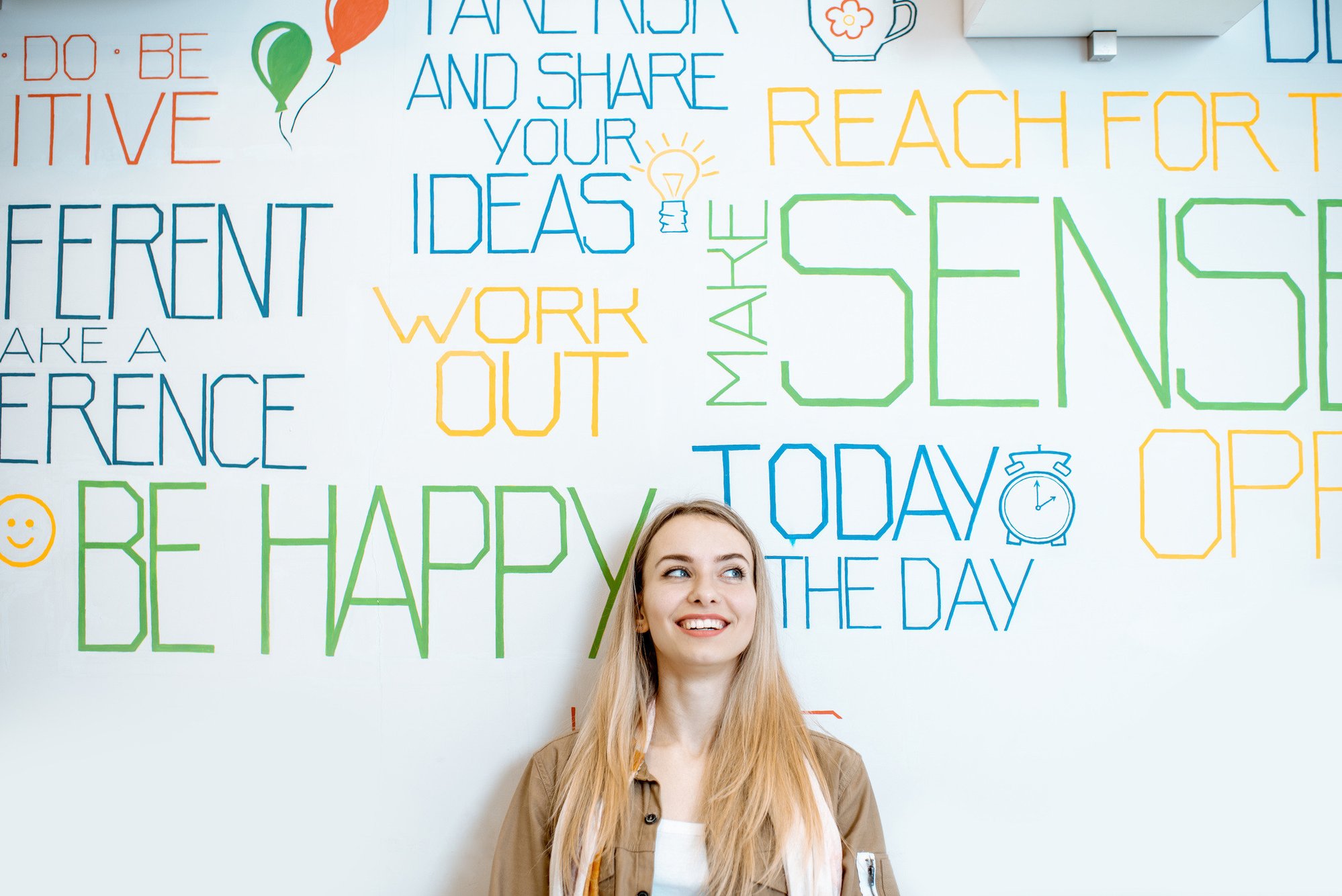 woman-on-the-wall-background-with-various-inscript-2023-11-27-05-11-44-utc